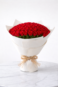 101 red roses bouquet in white wrapping, luxury flower delivery Dubai