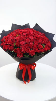 101 red rose bouquet with red wrapping, luxury anniversary flowers Dubai