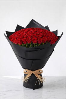 101 red roses in black wrapping, luxury flowers Dubai