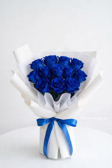 Grand blue roses bouquet, white wrapping, unique flowers Dubai