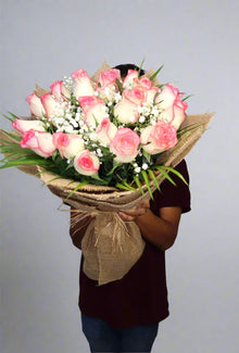 Jute wrapping double pink rose bouquet, roses Dubai