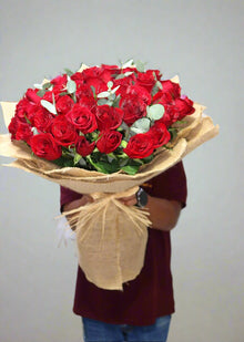 51 red rose bouquet in jute wrapping, roses Dubai