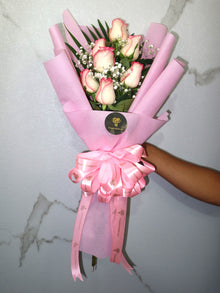 Double pink rose bouquet in pink wrapping, roses Dubai