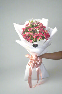 Double colour spray rose bouquet in white wrapping, roses Dubai