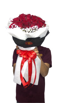 30 red roses in black and white wrapping, roses Dubai
