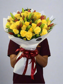Yellow roses and red lily bouquet, flower delivery Dubai