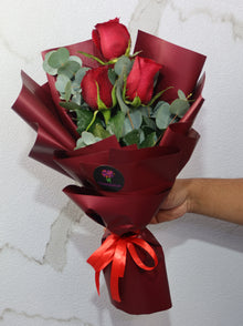 Three red rose bouquet with eucalyptus, roses Dubai