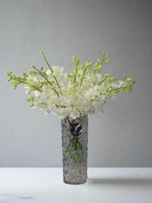 White orchids in crystal vase, flower delivery Dubai