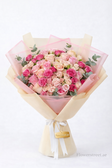 Luxury pastel bouquet with peach and pink roses, flower delivery Dubai