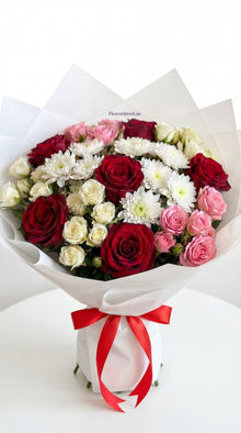 Mixed rose and chrysanthemum bouquet with red and pink spray roses, Dubai flower delivery