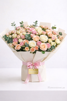 Signature spray rose bouquet in peach, pink and white, luxury flowers Dubai