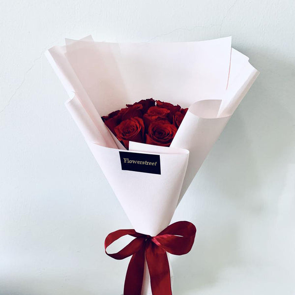 Red Rose Bouquet With Pink Wrapping