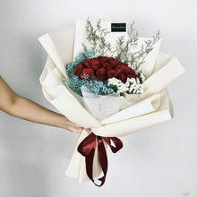 Red rose bouquet with blue baby's breath, roses Dubai