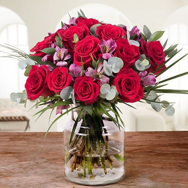 Red Roses And Eucalyptus In Vase