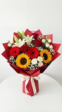 Sunflower Bloom bouquet with red roses and gerberas, flower bouquet Dubai