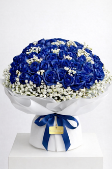 Signature blue rose bouquet with baby's breath, unique roses Dubai