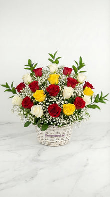 Sunny Rose basket with red, white and yellow roses, flower delivery Dubai