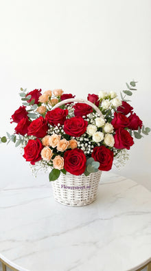 Red Rose Basket Delight with peach spray roses, flower delivery Dubai