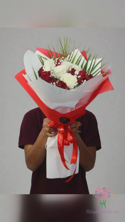 Ten red and five white roses bouquet