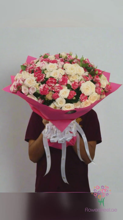 Two-tone pink and peach spray rose bouquet