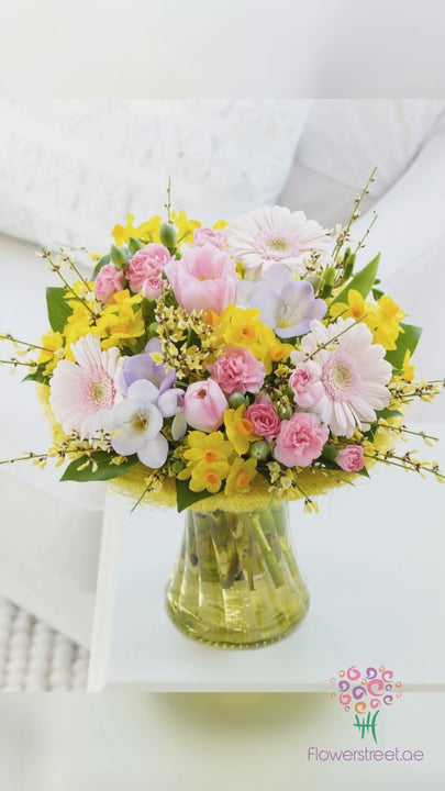 Pink and Yellow Flowers in Vase