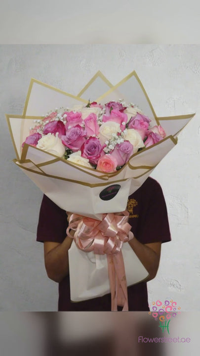 Thirty mixed roses bouquet in pink, cream and peach