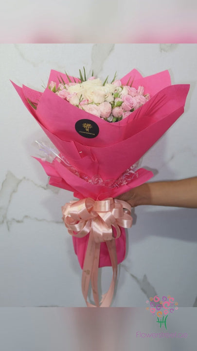 Pink spray roses with white roses bouquet