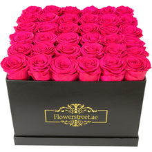 Fuchsia pink roses in square box, luxury rose box Dubai